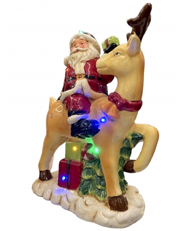 Статуетка Санта на Олені з  LED підсвіткою та музикою 27см